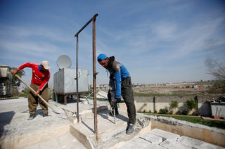 2018-03-28T130923Z_1829723631_RC1E6B7A92F0_RTRMADP_3_IRAQ-MOSUL-DISPLACED-RETURN.JPG