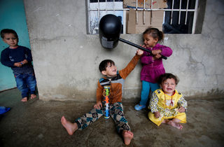 2018-03-28T130933Z_337791878_RC16D1E98BC0_RTRMADP_3_IRAQ-MOSUL-DISPLACED-RETURN(1).JPG