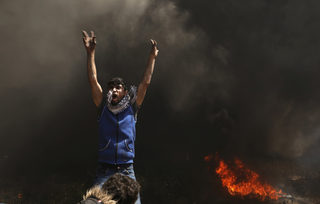2018-04-06T115302Z_154525236_RC1DF6B24FF0_RTRMADP_3_ISRAEL-PALESTINIANS-PROTESTS.JPG
