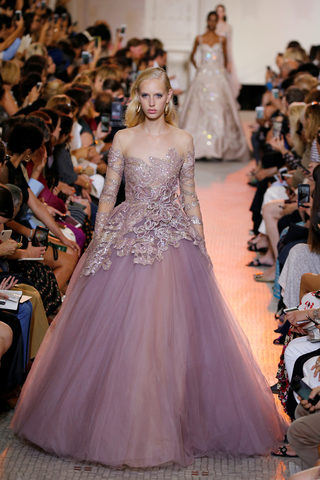 A model presents a creation by designer Elie Saab as part of his Haute Couture Fall/Winter 2018/2019 fashion show in Paris