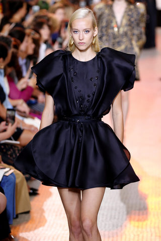 A model presents a creation by designer Elie Saab as part of his Haute Couture Fall/Winter 2018/2019 fashion show in Paris