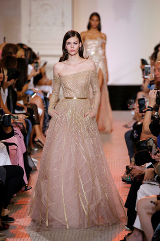 A model presents a creation by designer Elie Saab as part of his Haute Couture Fall/Winter 2018/2019 fashion show in Paris