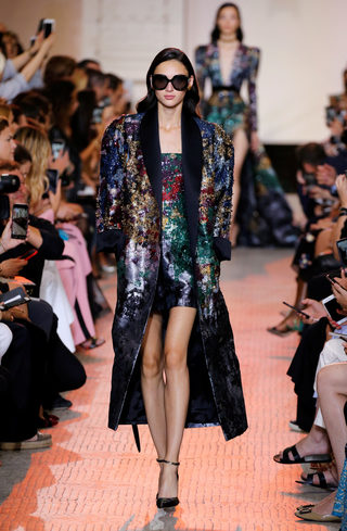 A model presents a creation by designer Elie Saab as part of his Haute Couture Fall/Winter 2018/2019 fashion show in Paris