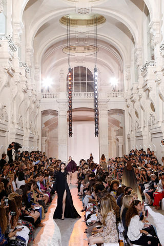 A model presents a creation by designer Elie Saab as part of his Haute Couture Fall/Winter 2018/2019 fashion show in Paris