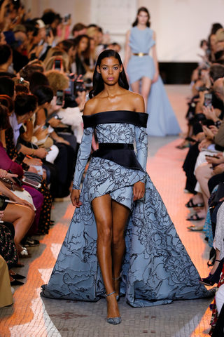 A model presents a creation by designer Elie Saab as part of his Haute Couture Fall/Winter 2018/2019 fashion show in Paris