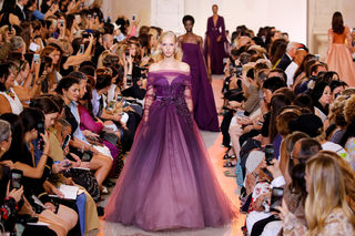 A model presents a creation by designer Elie Saab as part of his Haute Couture Fall/Winter 2018/2019 fashion show in Paris