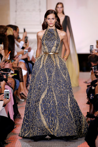 A model presents a creation by designer Elie Saab as part of his Haute Couture Fall/Winter 2018/2019 fashion show in Paris