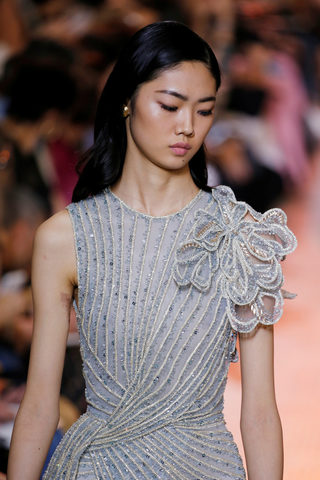 A model presents a creation by designer Elie Saab as part of his Haute Couture Fall/Winter 2018/2019 fashion show in Paris