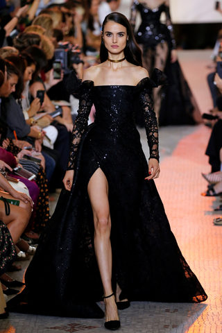 A model presents a creation by designer Elie Saab as part of his Haute Couture Fall/Winter 2018/2019 fashion show in Paris