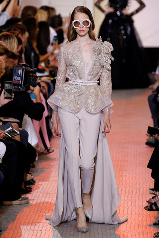 A model presents a creation by designer Elie Saab as part of his Haute Couture Fall/Winter 2018/2019 fashion show in Paris