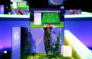 Professional Xbox player jurt0411, real name Kurt Fenech reacts while playing in the group stages of the FIFA eWorld Grand Final at the O2 Arena in London