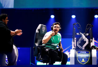 Mosaad 'MSDossary' Aldossary of Saudia Arabia celebrates after defeating Stefano 'Pinna' Pinna of Belgium in the Final of the FIFA eWorld Cup 2018 at The O2 Arena in London
