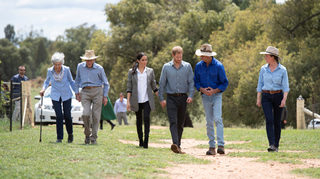 Britain's Prince Harry and his wife Meghan, Duchess of Sussex visit Mountain View Farm and meet the Woodley family in Dubbo