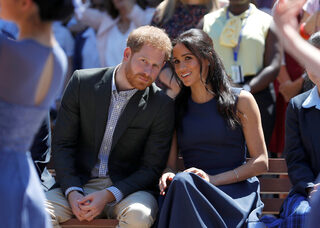 Britain's Harry and his wife Meghan, Duchess of Sussex, visit Macarthur Girls High School in Sydney