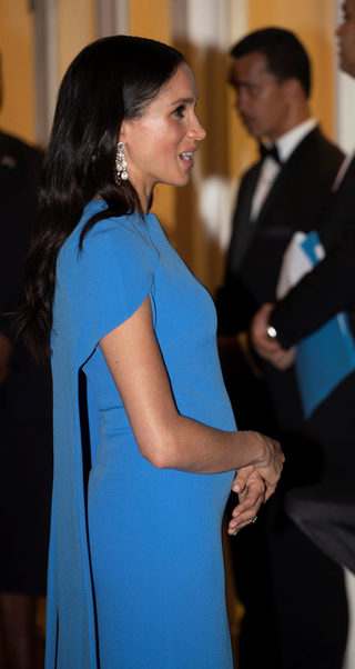 Britain's Meghan, the Duchess of Sussex, arrives for a reception and state dinner hosted by Fiji's President Jioji Konrote at Grand Pacific Hotel in Suva