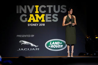 Britain's Prince Harry and Meghan, Duchess of Sussex, at the Invictus Games Sydney closing ceremony