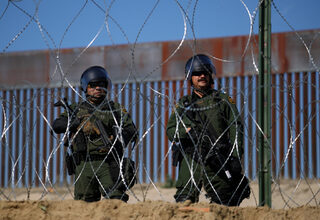 2018-11-26T021420Z_21061788_RC1D8419F300_RTRMADP_3_USA-IMMIGRATION-CARAVAN.JPG