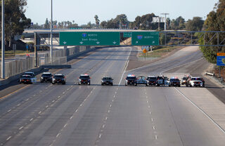 2018-11-26T024122Z_819442816_RC1ED13AC060_RTRMADP_3_USA-IMMIGRATION-CARAVAN.JPG