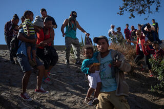 2018-11-26T043918Z_1978004281_RC1E9B2161B0_RTRMADP_3_USA-IMMIGRATION-CARAVAN.JPG