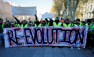 2018-12-08T110126Z_962512174_RC116942F090_RTRMADP_3_FRANCE-PROTESTS.JPG