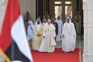 Pope Francis attends a welcome ceremony at the Presidential Palace in Abu Dhabi