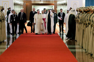 Pope Francis is welcomed by Abu Dhabi's Crown Prince Mohammed bin Zayed Al-Nahyan in Abu Dhabi