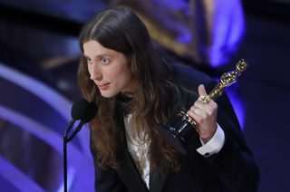 2019-02-25T032632Z_291672538_HP1EF2P09K75B_RTRMADP_3_AWARDS-OSCARS.JPG