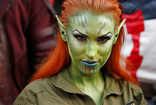 A fan dressed as a Skrull attends the premiere for the movie "Captain Marvel" in Los Angeles