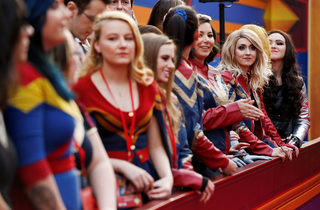 Fans in costume attend the premiere for the movie "Captain Marvel" in Los Angeles