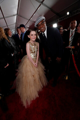 Cast members Mckenna Grace and Samuel L. Jackson pose at the premiere for the movie "Captain Marvel" in Los Angeles