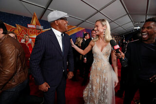 Cast members Brie Larson and Samuel L. Jackson talk at the premiere for the movie "Captain Marvel" in Los Angeles