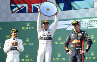 Mercedes' Valtteri Bottas holds the winners trophy after winning the Formula One F1 Australian Grand Prix at the Albert Park Grand Prix Circuit in Melbourne