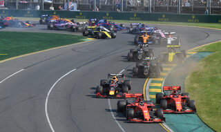 Ferrari's Sebastian Vettel and Charles Leclerc drive through turn two during the Formula One F1 Australian Grand Prix at the Albert Park Grand Prix Circuit in Melbourne
