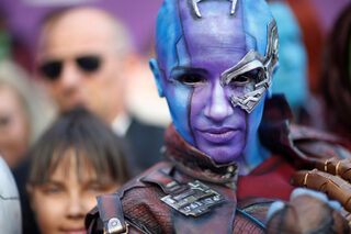 Fans dressed up in costume await the cast members on the red carpet at the world premiere of the film "The Avengers: Endgame" in Los Angeles