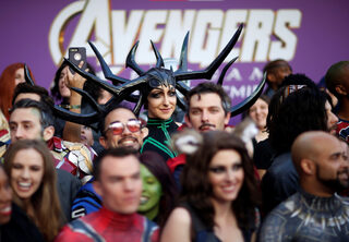 Fans dressed up in costume await the cast members on the red carpet at the world premiere of the film "The Avengers: Endgame" in Los Angeles