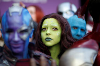 Fans dressed up in costume await the cast members on the red carpet at the world premiere of the film "The Avengers: Endgame" in Los Angeles
