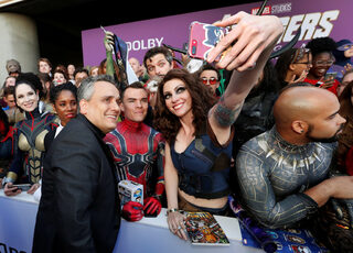 Director Anthony Russo poses with fans on the red carpet at the world premiere of the film "The Avengers: Endgame" in Los Angeles