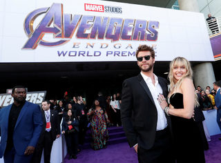 Actor Liam Hemsworth poses with his wife Myley Cyrus pose on the red carpet at the world premiere of the film "The Avengers: Endgame" in Los Angeles