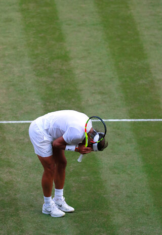 2019-07-12T184326Z_381797223_RC1DE05B5760_RTRMADP_3_TENNIS-WIMBLEDON.JPG
