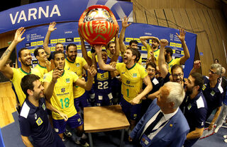 TeamBrazilcelebratewithacuptheirwininTokyovolleyballqualificationinVarna.jpg