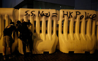 People march during a rally to demand democracy and political reforms in Hong Kong