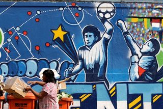 2020-11-25T193642Z_998925653_RC2JAK91LQAW_RTRMADP_3_SOCCER-ARGENTINA-MARADONA-HAND.JPG