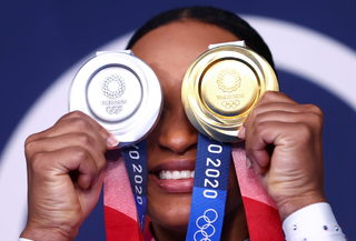 2021-08-02T000000Z_536363443_RC2ZWO9C6MJP_RTRMADP_3_OLYMPICS-2020-GAR-W-1APFX-MEDAL.JPG