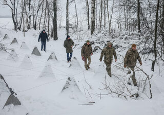 2024-01-11T084529Z_1080685786_RC2ZE5AB6KMA_RTRMADP_3_UKRAINE-CRISIS-FORTIFICATIONS-BORDER-RUSSIA.JPG