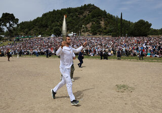 2024-04-16T094354Z_1988990452_UP1EK4G0R141U_RTRMADP_3_OLYMPICS-2024-FLAME.JPG