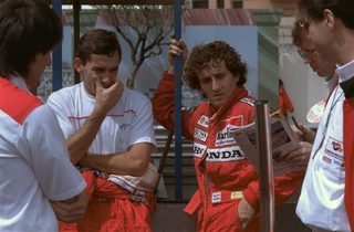 Prost teammate Senna chat in the McLaren paddocks in Monaco May 15, 1988 before the start of the 46th Formula One Monaco GP Senna gets pole ahead Prost.jpg