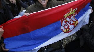 Неизвестен намушка седмина празнуващи в центъра на Белград