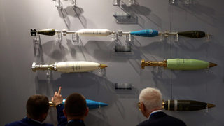 Фотогалерия: <span class="highlight">Изложение</span> в Лондон представи най-новото на оръжейния пазар