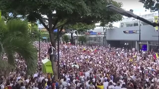 Хиляди привърженици на опозицията участваха в мащабен протест в Каракас