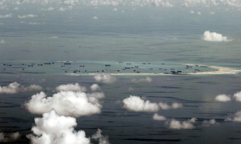 Рифът Мисчиф на островите Спратли в Южнокитайско море - Китай е обвиняван, че разширява няколко рифа в региона за военни цели.